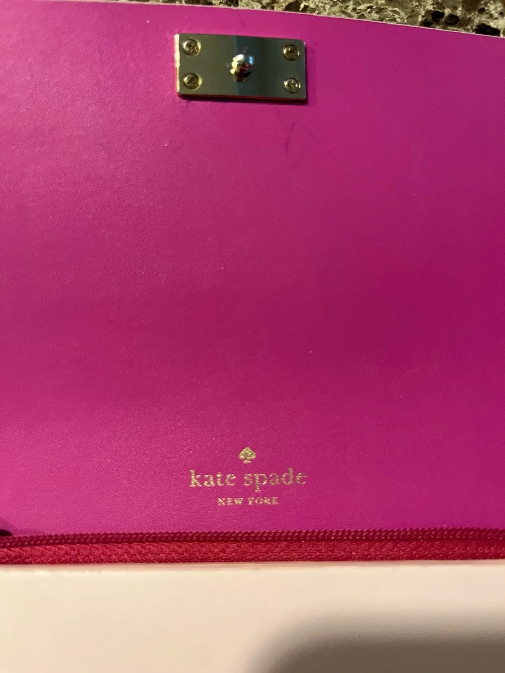 kate spade pale pink leather clutch with gold logo plaque